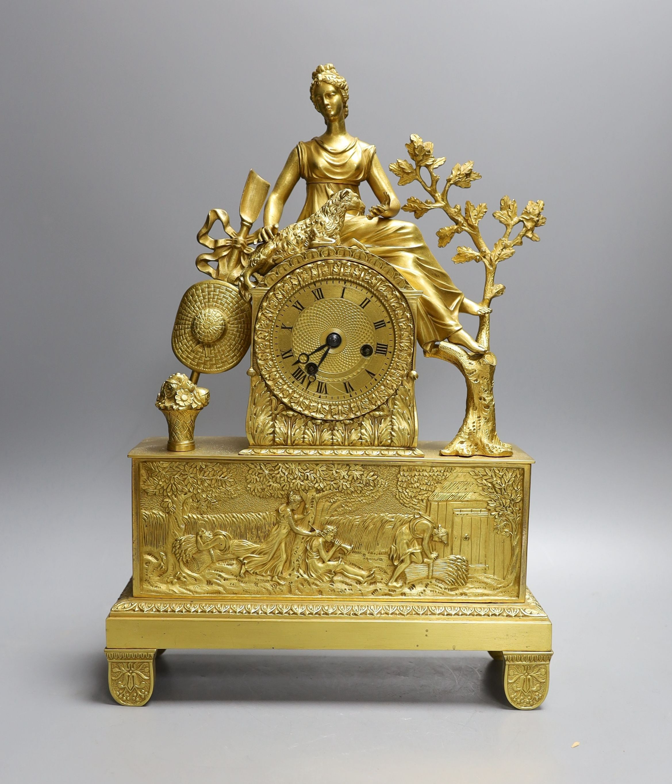 A 19th century Louis XVI style ormolu mantel clock with Shepherdess - 40cm high